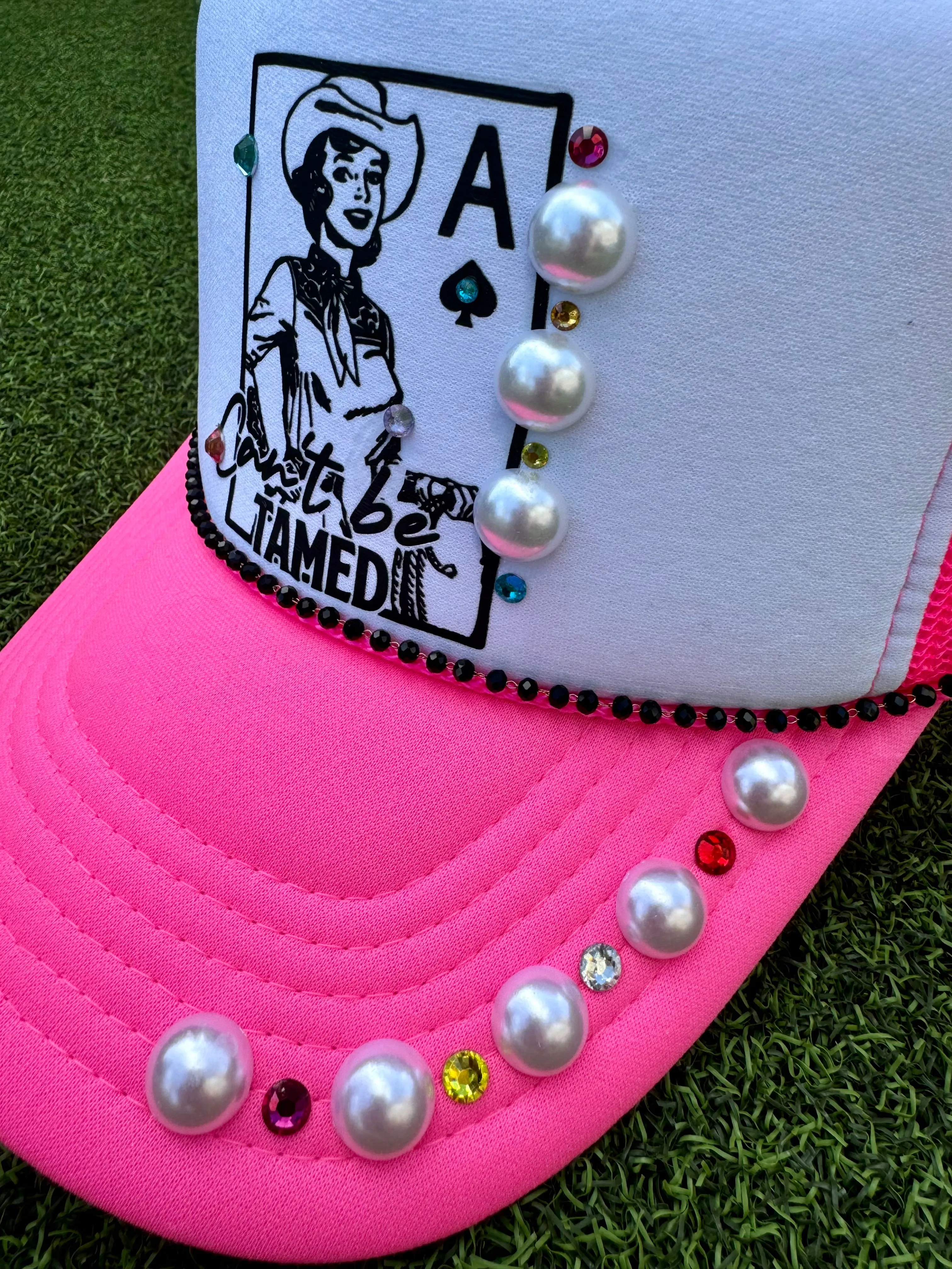 Can’t Be Tamed Trucker Hat