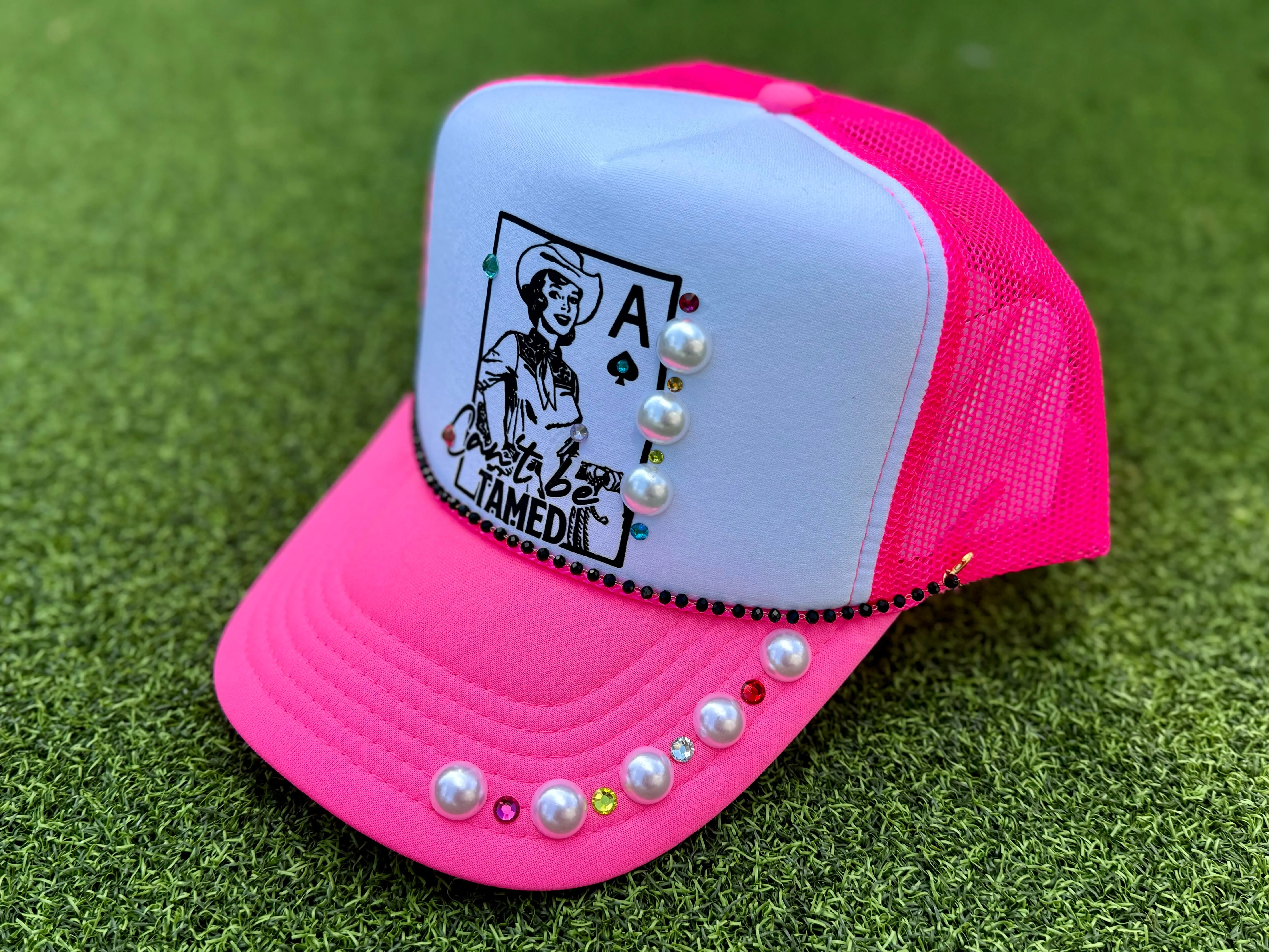 Can’t Be Tamed Trucker Hat
