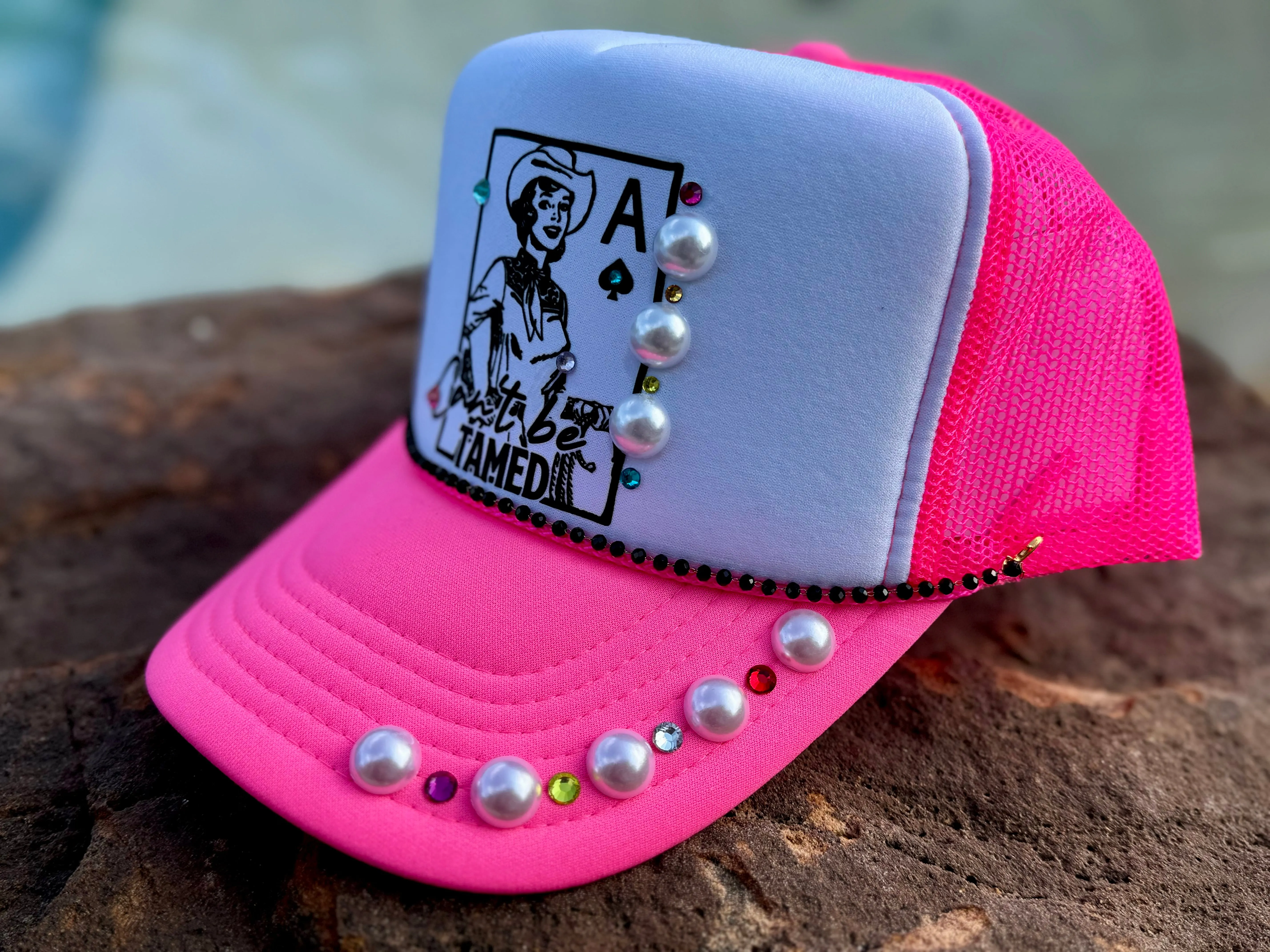 Can’t Be Tamed Trucker Hat